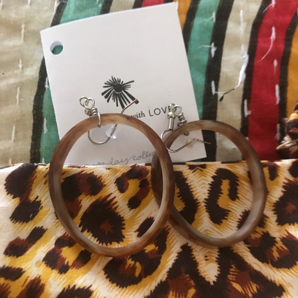 Noonday cow horn earrings